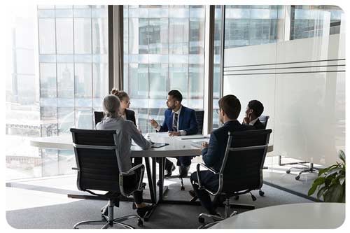 employees meeting in boardroom