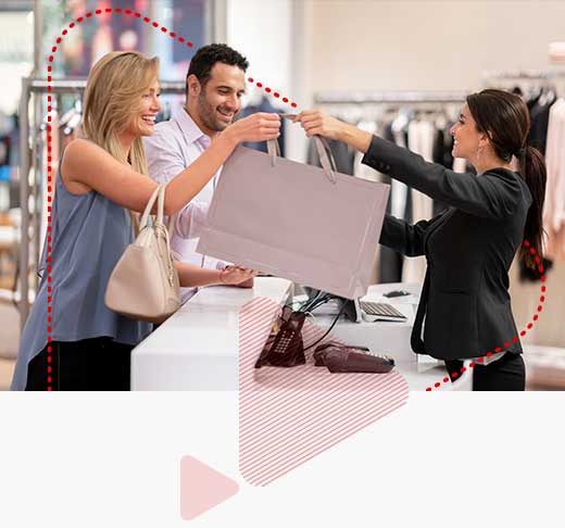 man and woman buying clothes at a retail store