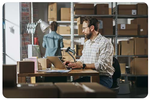 Two employees Working in a storeroom