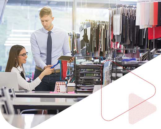young man and woman working in clothing store