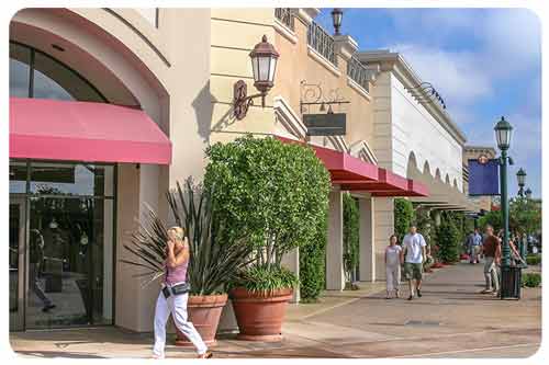Woman walking in an outdoor mall