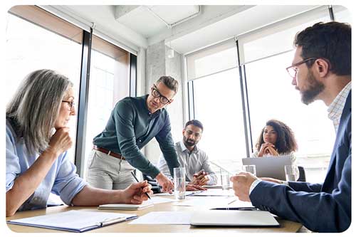 businesspeople working together in boardroom