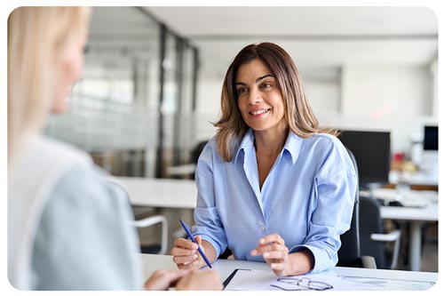 recruitmer talking to recruit during a job interview