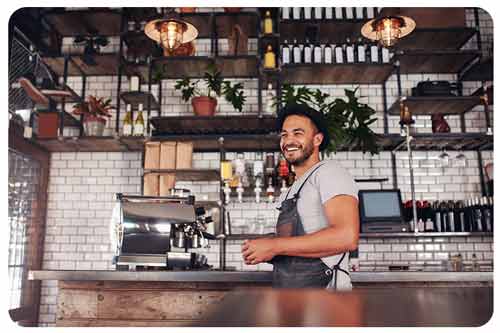 bar owner standing at the counter