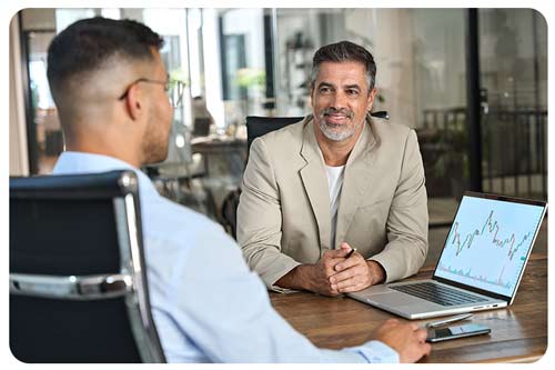 two financial advisor analyst discussing at office meeting