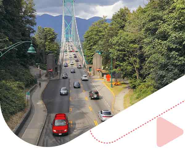 cars passing by over the bridge road