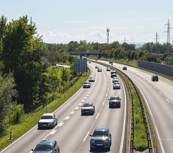 Canadian highway with vehicles in traffic