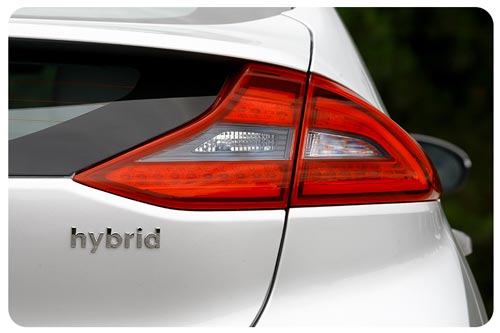 rear light of a white hybrid car