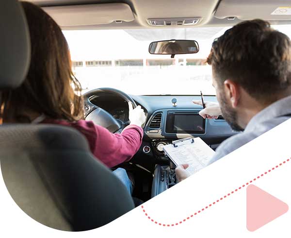 a astudent practicing in driving width an instructor.