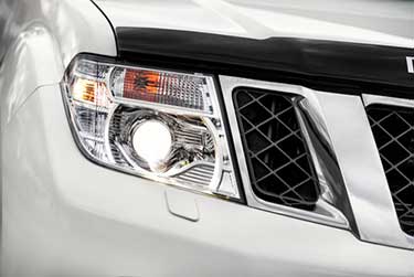 Headlight of a white Jeep