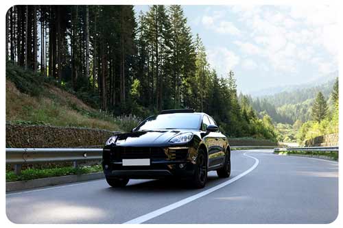black luxury car drving on road