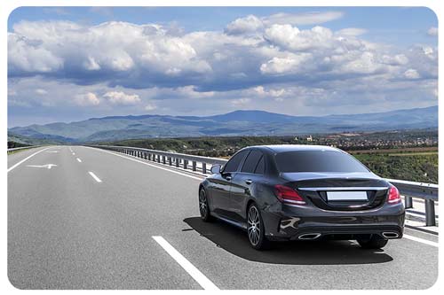 car is driving on road