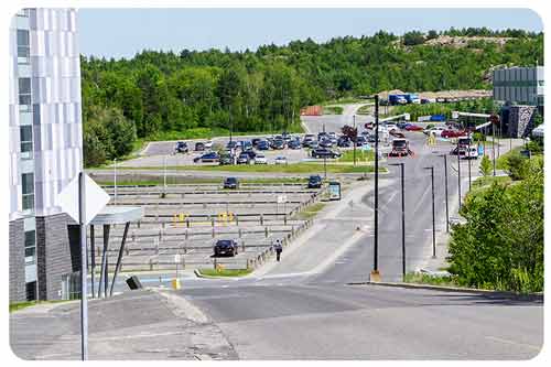 cars driving Sudbury urban road
