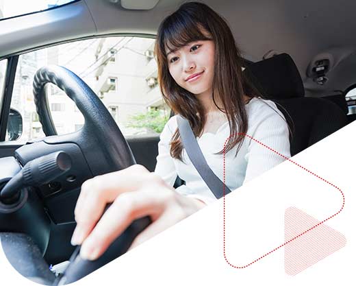 Young woman driving a car