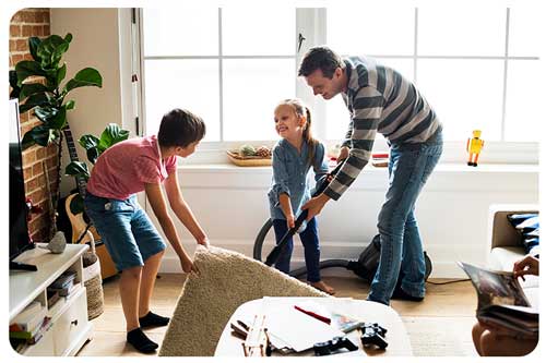 family clearning room together 