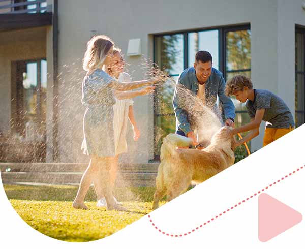 family having fun together in backyard