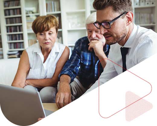 couple speaking with an advisor in thier home