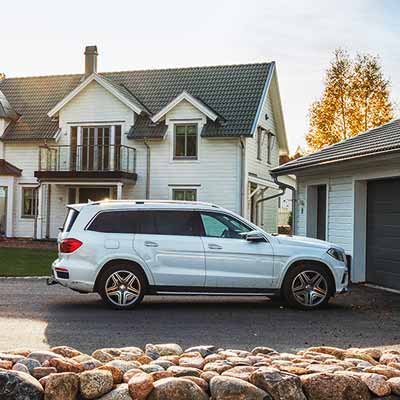 SUV parked outside a house