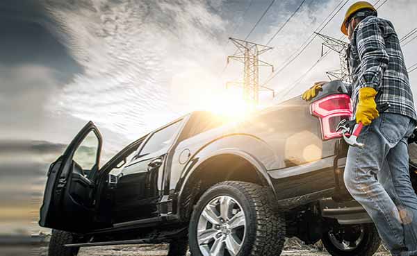 A Worker and His Company Pickup Truck