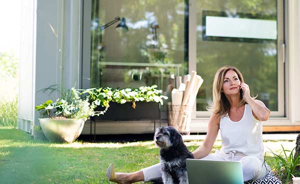 woman sitting on grassin garden