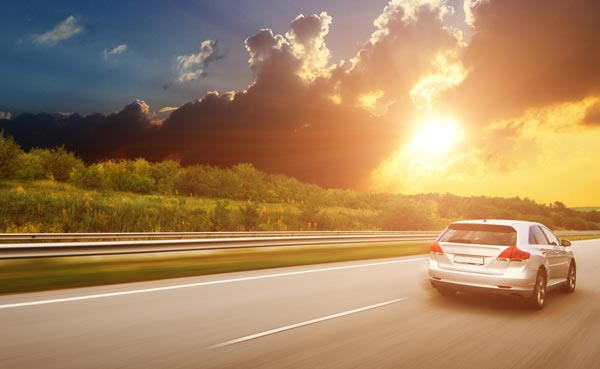 Silver car driving on the highway
