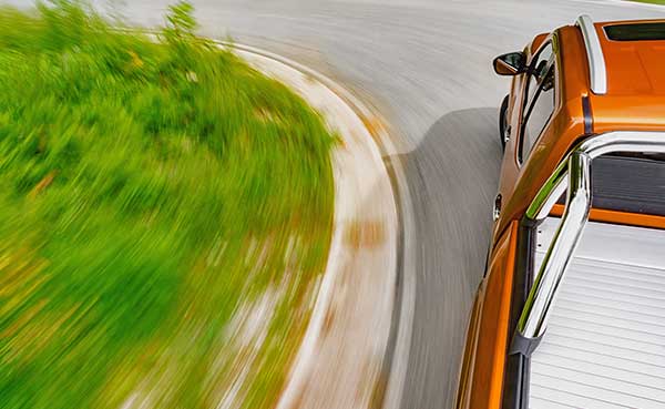 picking up truck on the side of the road