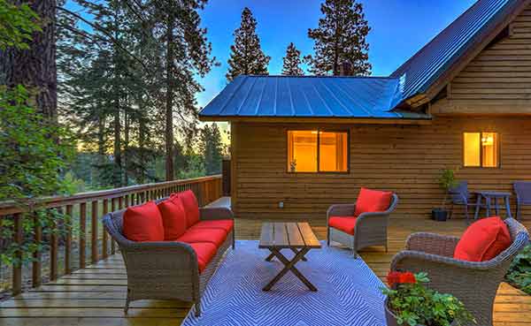 deck at log house with nature