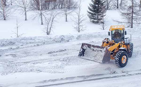 snow plow doing snow removal
