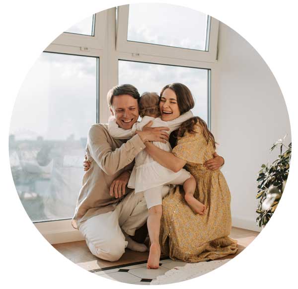 Woman enjoyson wooden terrace near the modern house