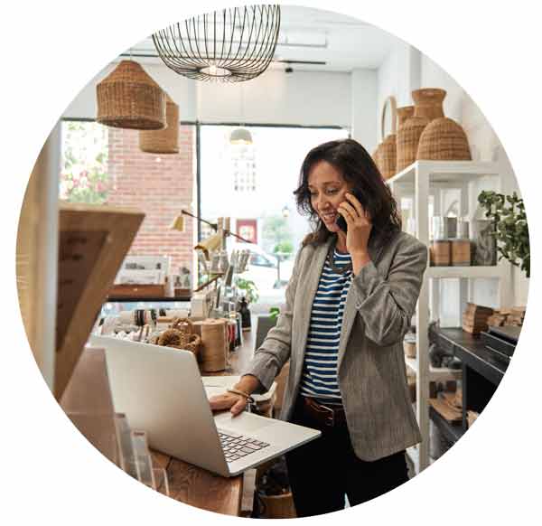 Business owner checking her laptop