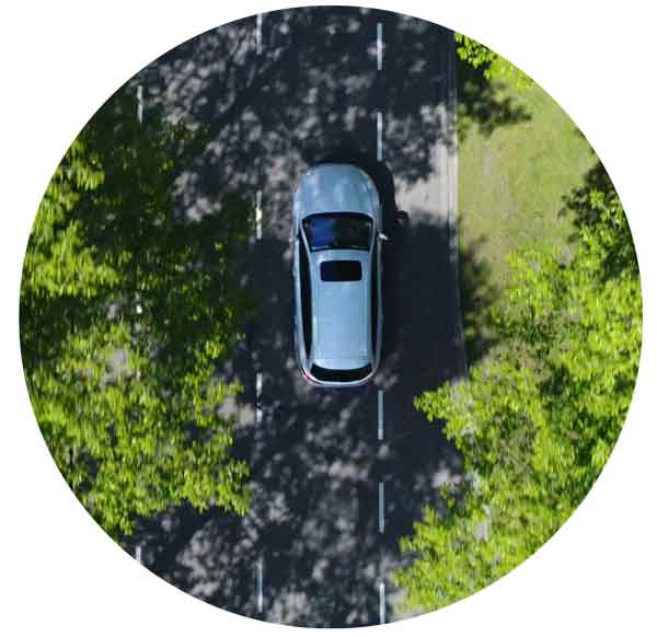 grey station wagon vehicle driving on road