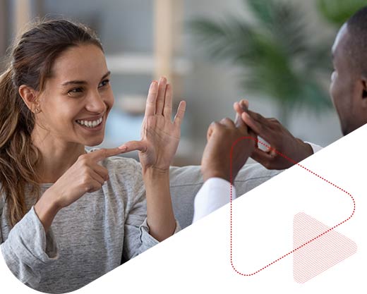 two deaf and mute hearing impaired people communicating