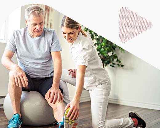 a physiotherapy worker with senior client