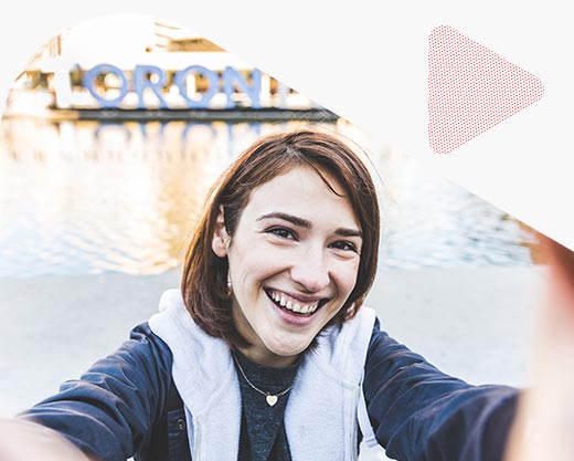 happy girl taking a selfie in Toronto