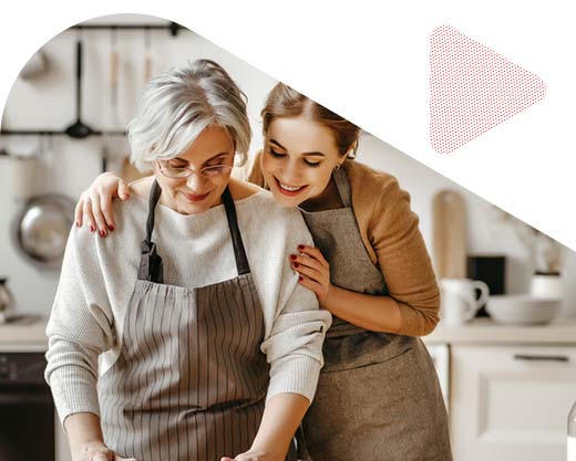 happy mother and daughter in the kitchen