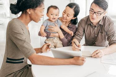 family signing documents