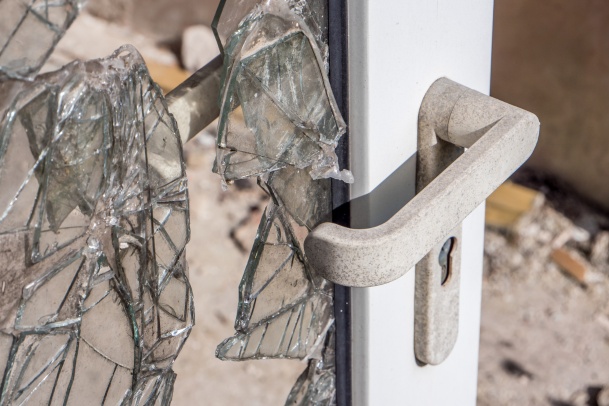 glass around door broken from burglary
