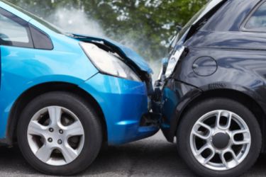 fender bender between blue and grey cars