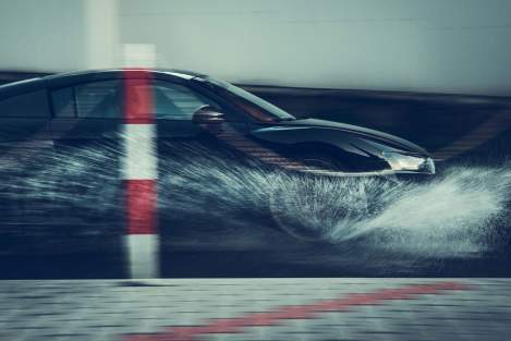 car hydroplaning on a rainy day