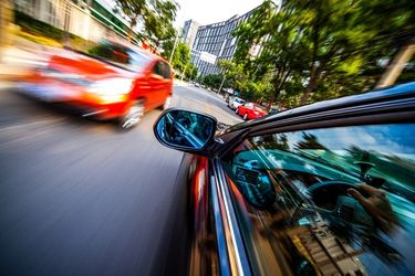 car speeding on highway
