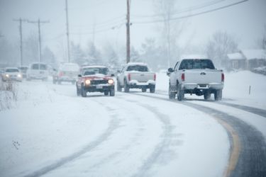 Vehicles driving in the snow