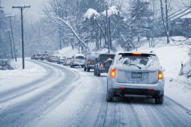 cars driving on a winter road