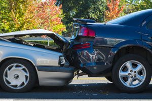 two car damaged cars after rear end collision