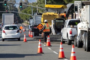 Construction zone signs on road