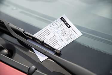 parking ticket on window