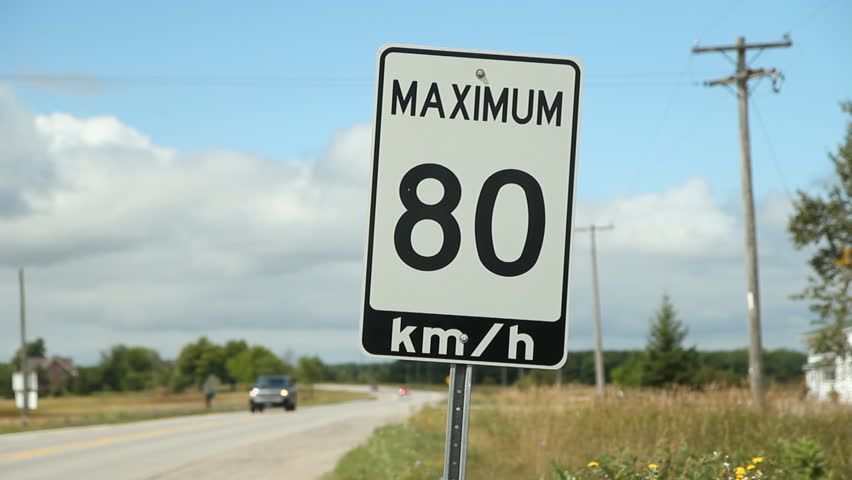 80 km per hour speed limit sign on country road