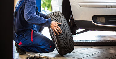 mechanic changing tires
