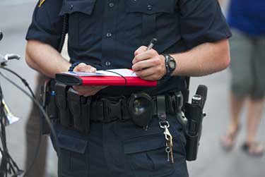 Police officer writing a ticket