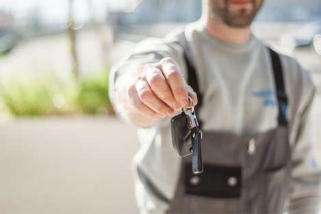 car key fob being held