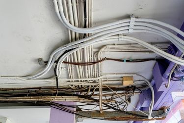 wiring along white beams